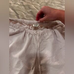 John Gault, pink and white striped lounge pants
